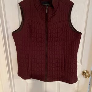 Burgundy vest.